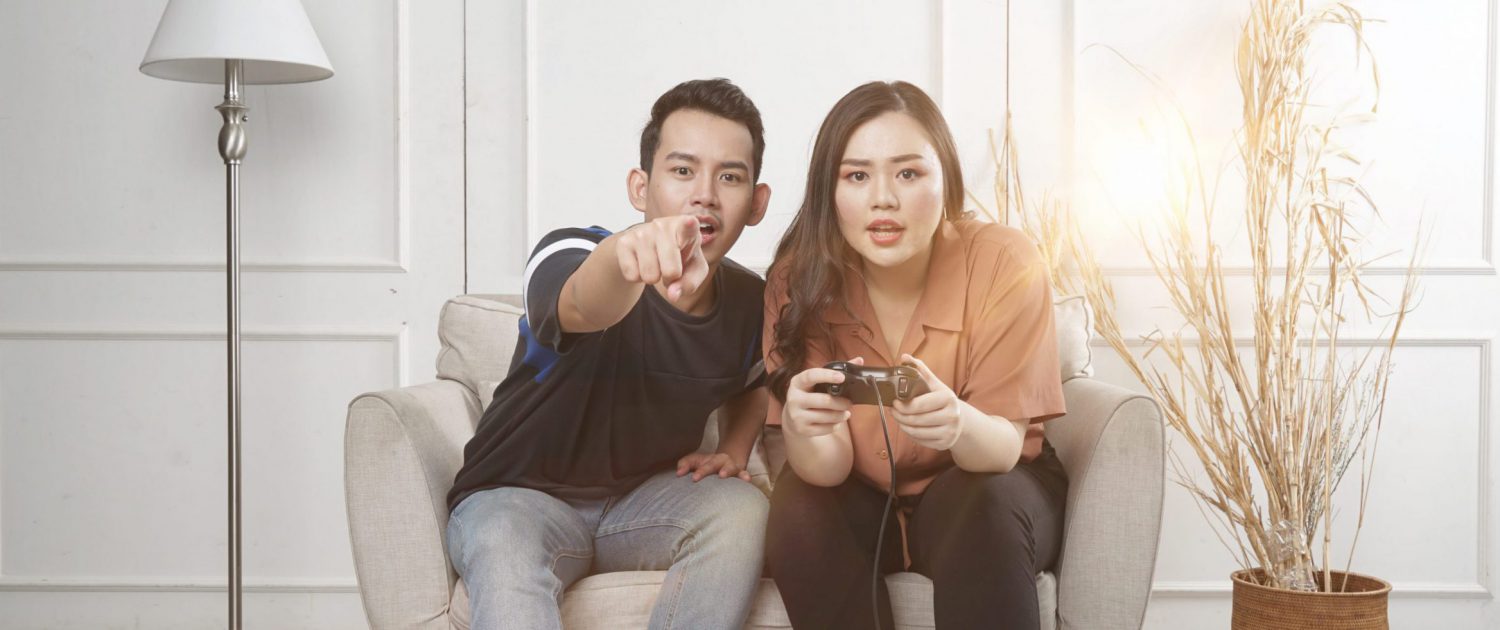 Asian consumers playing video games