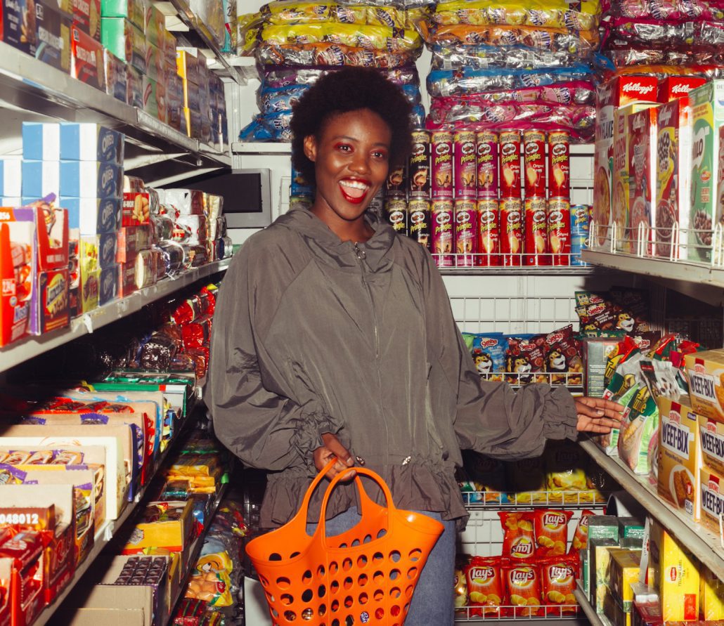 Happy Black Woman shopping for groceries