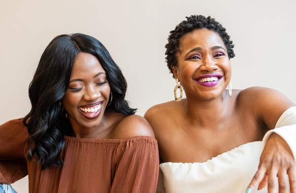 Two Gen X black women smiling