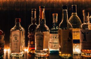 Row of various liquor bottles