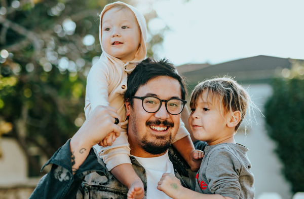 Hispanic man with his two children