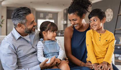 multicultural family with mom, dad, young daughter and son