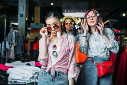 Gen Z friends shopping for sunglasses