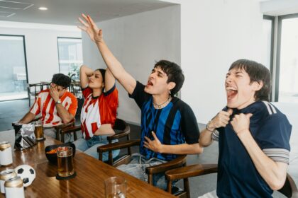 Hispanic sports fans cheering