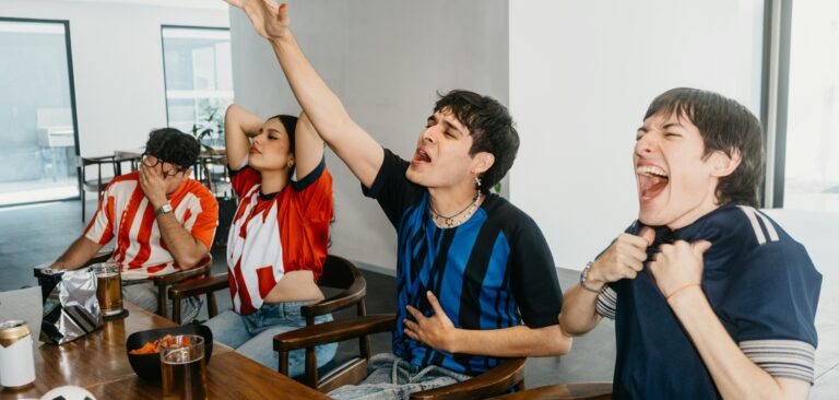 Hispanic sports fans cheering